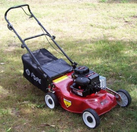 Lawn mower on the lawn consumer grade red and black Pope branded lawn mower on the lawn